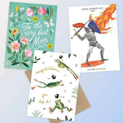 A collection of colorful Mother's Day greeting cards on a  teal blue background.