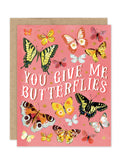 The Biely & Shoaf "You Give Me Butterflies Luxe Anniversary Card" features a pink background, vibrant butterflies, playful white text, and comes with a brown envelope. Eco-friendly and part of the A2 Luxe Collection.