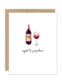 The Aged To Perfection Luxe Birthday Card by Biely & Shoaf features a watercolor wine bottle and glass above "aged to perfection" in handwritten script, accented with elegant gold foil details.