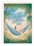 The Hammock Birthday Card by Biely & Shoaf features Carrie Shryock’s illustration of a person relaxing in a hammock, reading under the sky with KICK BACK, RELAX, and ENJOY YOUR DAY!—a tranquil nature scene for any birthday.