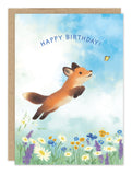 A joyful fox leaps toward a butterfly on this charming Little Fox Birthday Card by Biely & Shoaf.