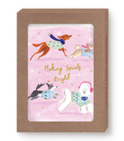 Biely & Shoaf’s Dogs Spirits Bright Boxed Set: 4 festive pups on pink, gold foil, perfect holiday cards.