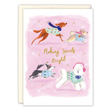Biely & Shoaf’s Dogs Making Spirits Bright Boxed Holiday Cards feature four dogs in festive sweaters on a pink background, with gold foil “Making Spirits Bright” text. Includes FSC-certified cards and envelopes.