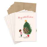 Child in striped shirt admires a star-topped tree; "Merry Little Christmas" above. Biely & Shoaf card set.