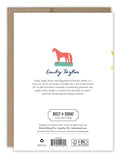 The back of the Charm Bracelet Birthday Card features a red horse illustration on green, artist Emily Taylor’s bio, and Biely & Shoaf logos. Printed on recycled paper with FSC certification and recycling details.