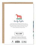 Back features a red horse, artist bio, gold foil accents, and Biely & Shoaf branding for Flower Bundles Sympathy Card.