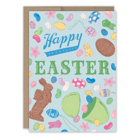 The Biely & Shoaf Easter Candy Happy Easter Card features chocolate bunnies, eggs, jellybeans, flowers, and candy on a light blue background—a cheerful card blending modern nostalgia and sweet holiday wishes.