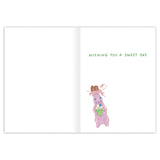 The Biely & Shoaf Easter Candy Happy Easter Card features "WISHING YOU A SWEET DAY" on the right, with a pink bunny holding a cupcake topped with a pink bow and chocolate. The left side is blank for your message—a charming modern card.