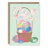 The Vintage Easter Basket Easter Card by Biely & Shoaf features a pastel basket with decorated eggs, a colorful "Wishing you a Happy Easter" banner, and a painted swan egg beside the basket. Printed in the USA.