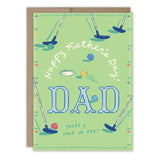 The Golf Father's Day Card by Biely & Shoaf features golf putters, balls, and "Happy Father's Day! DAD You're a hole in one!" on a green background. Illustrated by Emily Taylor and printed in the USA.