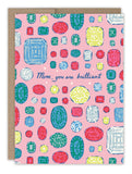 The Gems Mother's Day Card by Biely & Shoaf features colorful illustrated gemstones on a pink background with “Mom, you are brilliant” in cursive at the center. Printed in the USA.