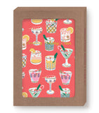 The Biely & Shoaf Festive Cocktails Boxed Holiday Cards feature illustrated cocktails and garnishes on a red background with "Sending Holiday Cheer" in gold foil script at the center.