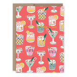 The Festive Cocktails Boxed Holiday Cards by Biely & Shoaf feature cheerful drink illustrations with candy canes, cranberries, and citrus on red. Printed on recycled paper, the card reads "Sending Holiday Cheer.