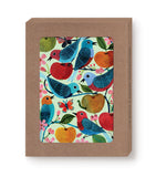 The Birds & Apples Notecard Set by Biely & Shoaf features blue and red birds among apples, pink flowers, green leaves, and a butterfly on FSC paper notecards in a brown box with a front window.