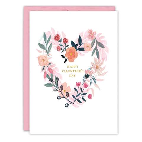 The Floral Heart Valentine's Day Card by Biely & Shoaf features a watercolor flower heart, gold "HAPPY VALENTINES DAY" text, a pink envelope, and is printed on FSC-certified recycled paper for an eco-friendly touch.