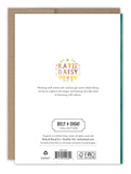 The back of the Bloom & Grow Birthday Card by Biely & Shoaf features Katie Daisy’s name with floral art, a short artist bio, and the Biely & Shoaf logo. It comes with an envelope and is printed on FSC-certified recycled paper.