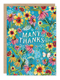 The Wild Meadow Thank You Card by Biely & Shoaf features vibrant flowers, green leaves, and a white butterfly on blue. Designed with gold foil details, it displays “MANY THANKS” in bold white letters at the center.
