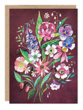 The Burgundy Bouquet Blank Card by Biely & Shoaf features vibrant flowers and green leaves on a deep maroon background with intricate details and a brown border, printed on FSC-certified recycled paper.