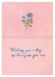 Meadow Birthday Card by Biely & Shoaf, pink with purple daisies, made from FSC-certified recycled paper.