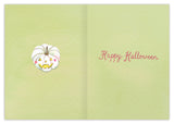 The Pumpkins Halloween Card by Biely & Shoaf features a pale green polka-dot background, a white carved pumpkin with a smiling face and blush cheeks, “Happy Halloween” in pink script, and is printed on recycled paper.