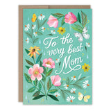 The Very Best Mom Floral Mother's Day Card by Biely & Shoaf features colorful flowers, butterflies, and "To the very best Mom" handwritten on a teal background. Designed by Katie Daisy and printed in the USA.