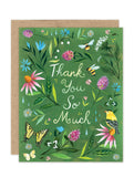 The Meadow Thank You Notecard Set by Biely & Shoaf features a green card with flowers, butterflies, bees, and a yellow bird around handwritten "Thank You So Much." Includes a brown envelope and is crafted with FSC paper. Perfect for any occasion.