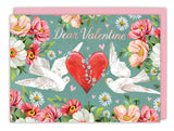 The Biely & Shoaf Love Birds Valentine's Day Card features “Dear Valentine” text, two white doves by a red heart with blue flowers, plus pink, white, and yellow blooms on a green background. Printed in the USA.