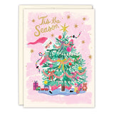 The Santa Trimming Tree Holiday Card by Biely & Shoaf features “Tis the Season” in gold script over a decorated tree with Santa, gifts, train, teddy bear, and gold stars—printed on luxurious FSC-certified recycled paper.