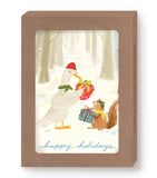 A duck and squirrel in winter hats exchange gifts on Biely & Shoaf’s Woodland Gift Exchange Holiday Card.