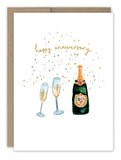 The Biely & Shoaf Champagne Anniversary Card features a champagne bottle, two glasses, confetti, and “happy anniversary” in gold foil. Printed on FSC-certified recycled paper.