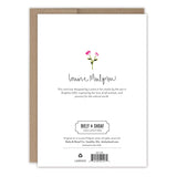 The back of the Church Blessings Easter Card by Biely & Shoaf features a small pink flower, publishing details for the collection, a partially visible brown envelope, and is proudly printed in the USA.