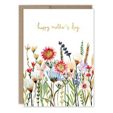 The Pressed Flowers Mother's Day Card by Biely & Shoaf features watercolor wildflowers and greenery with a gold "Happy Mother's Day" message. Printed on FSC-certified recycled paper and paired with a brown envelope.