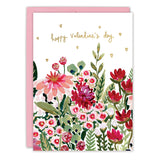 The Biely & Shoaf Floral Valentine's Day Card features "Happy Valentine's Day" in gold cursive above pink, red, and white flowers with small gold hearts. Printed on FSC-certified recycled paper and comes with a pink envelope.