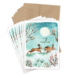 Biely & Shoaf Bunnies Merry Christmas card set: two rabbits in snow, recycled paper, envelopes included.