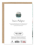 Back of Peace On Earth Snowy Scene card with handwritten text, animal winter design, and Biely & Shoaf branding.