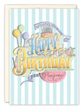 The Bold Lettering Carnival Birthday Card by Biely & Shoaf features pastel blue and white stripes, festive balloons, cake, candles, gifts, and reads Wishing you a Happy Birthday and many more! Printed in the USA.