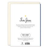 The back of the Celestial Graduation Card by Biely & Shoaf displays a gold star, Lisa Jane Smith’s cursive illustration, her art description, collection logo, copyright details, and “Printed in USA” on crisp white.