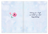 The Inner Moonlight Birthday Card by Biely & Shoaf features a light blue watercolor background, a pink flower on the left, and the message “Wishing you a bright and beautiful year ahead. Happy Birthday!” printed on recycled paper.