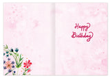 The Biely & Shoaf All That Makes You Wonderful Birthday Card is an open pink card with watercolor flowers in the bottom left, gold foil accents, and “Happy Birthday” in red cursive on the right.