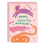 The Wild Thing Valentine's Day Card by Biely & Shoaf features playful pink and orange illustrations of a lion, crocodile, and snake with hearts, plus the message “Happy Valentine’s Day, Wild Thing.” Printed in the USA.