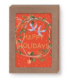 Wreath Happy Holidays Boxed Set by Biely & Shoaf features blue birds, green leaves, and gold foil in a brown box.