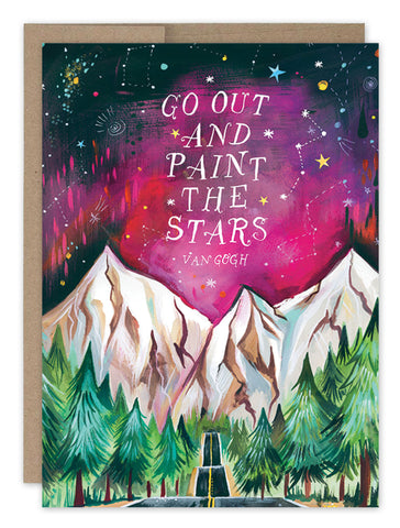 The Biely & Shoaf Holding You Sympathy Card features Van Goghs quote, Go out and paint the stars. It vividly portrays a night sky with stars, northern lights, snowy mountains, and green pine trees. The card is paired with a brown envelope.