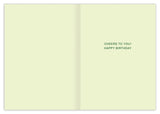 The Beer-Day Birthday Card by Biely & Shoaf features a pale yellow interior with centered green text: CHEERS TO YOU! HAPPY BIRTHDAY. The left side is blank. Printed on recycled paper, its an eco-friendly choice.