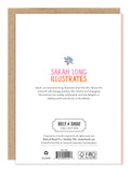 The back of the Howdy Birthday Card by Biely & Shoaf features “Sarah Long Illustrates” with a blue flower above it, Sarah Long’s short bio, Biely & Shoaf branding, and includes a brown envelope partially visible behind the card.