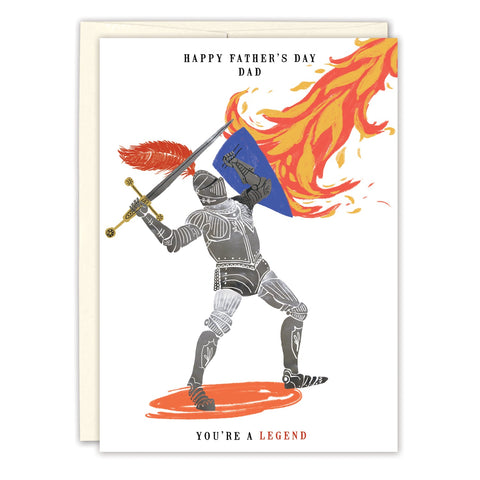 The Knight You're A Legend Father's Day Card by Biely & Shoaf features a knight with a flaming sword and blue shield, "Happy Father's Day Dad" above, "You’re a legend" below. Designed by Sarah Long and printed in the USA.