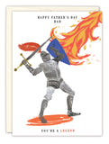 The Biely & Shoaf "Knight You're A Legend Father's Day Card" features a knight in armor with a flaming sword and blue lion shield, standing on orange. Text reads "Happy Fathers Day Dad" above and "You’re a legend" below. Illustration by Sarah Long.