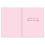 The Queen Of Moms Mother's Day Card by Biely & Shoaf is an open pink card with gold foil accents, illustrated by Sarah Long. It reads "Wishing you a day worthy of your crown" in red uppercase on the right; the left side is blank.